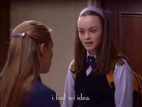 Animated scene of two young women talking, with one reacting in surprise as the subtitle reads, ‘I had no idea.’